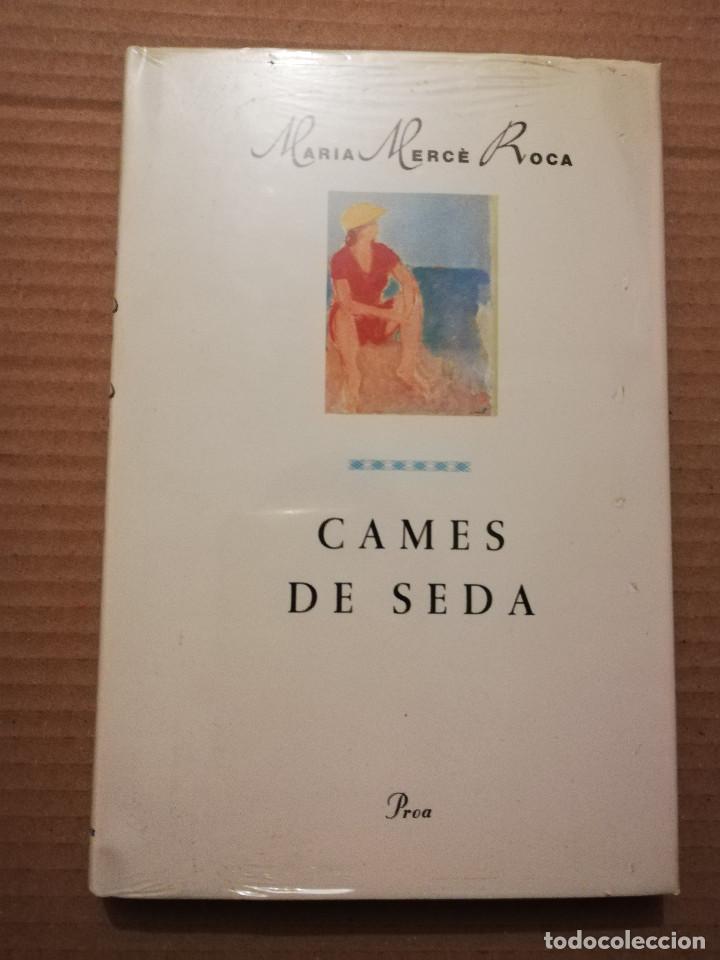 Libros de segunda mano: CAMES DE SEDA (MARIA MERC&Egrave; ROCA) PRECINTADO - Foto 1