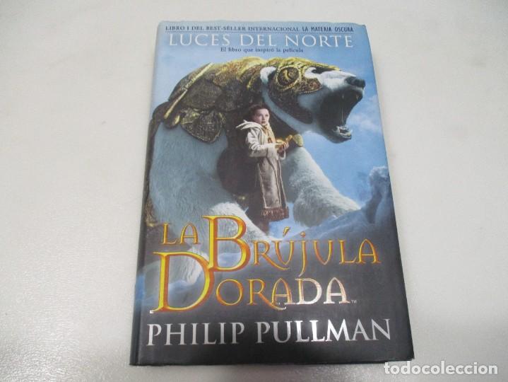 Libros de segunda mano: PHILIP PULLMAN La br&uacute;jula dorada W9003 - Foto 1