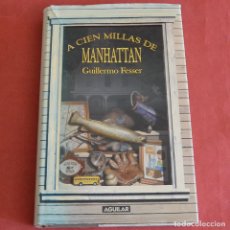 Libros de segunda mano: A CIEN MILLAS DE MANHATTAN - GUILLERMO FESSER - SANTILLANA 1ª EDICION 2008
