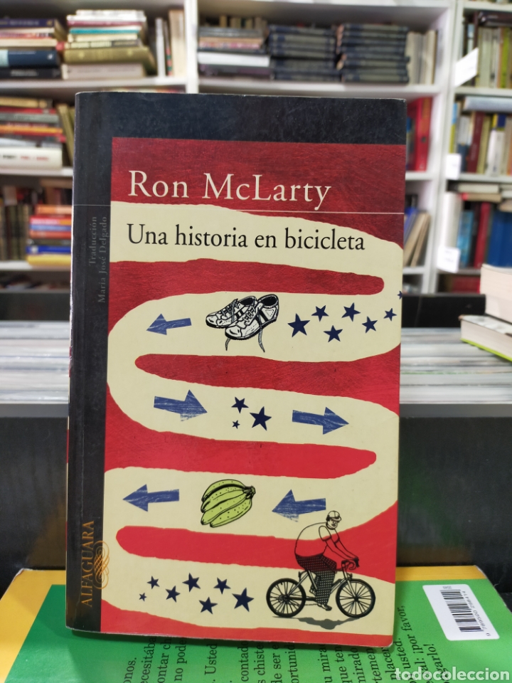 Libros de segunda mano: UNA HISTORIA EN BICICLETA - RON McLARTY - Foto 1