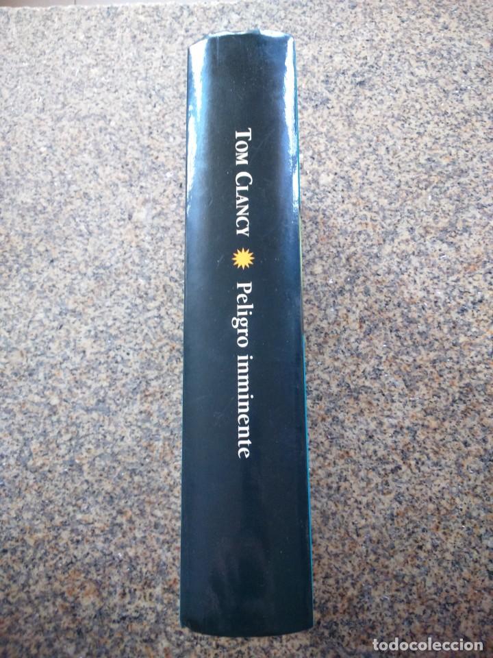 Libros de segunda mano: PELIGRO INMINENTE -- TOM CLANCY -- RBA -- - Foto 2