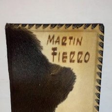 Libros de segunda mano: EL GAUCHO MARTIN FIERRO-LA VUELTA DE MARTIN FIERRO - ILUSTRA MARIA LUISA ARA - TAPAS EN PIEL DE VACA. Lote 346656668