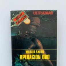 Libros de segunda mano: OPERACIÓN ORO. WILBUR SMITH. ED. ULTRAMAR, 1976. PRIMERA EDICIÓN.. Lote 354625118