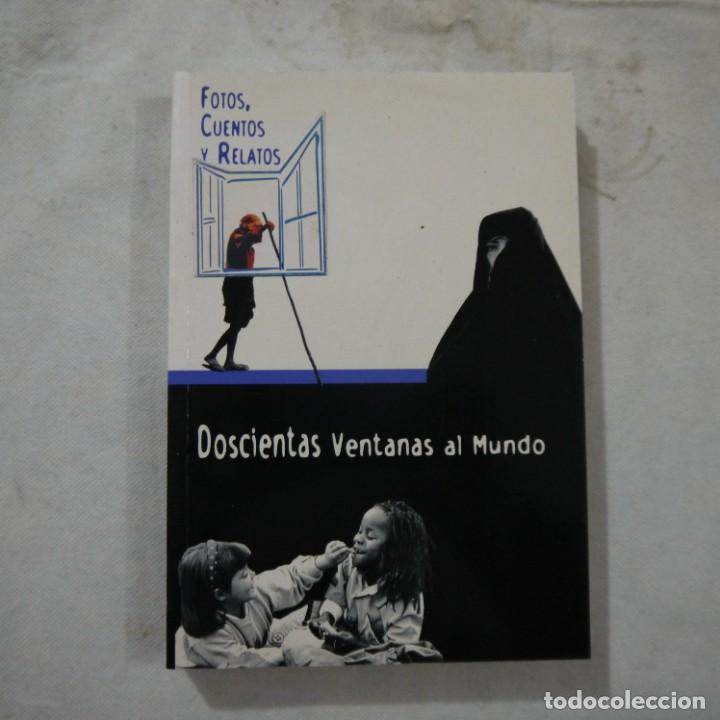 Libros de segunda mano: DOSCIENTAS VENTANAS AL MUNDO. FOTOS, CUENTOS Y RELATOS - VARIOS AUTORES - 2006