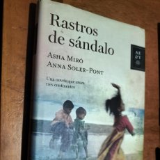 Libros de segunda mano: RASTROS DE SÁNDALO. ASHA MIRÓ. ANNA SOLER-PONT. TAPA DURA. BUEN ESTADO. Lote 380592119