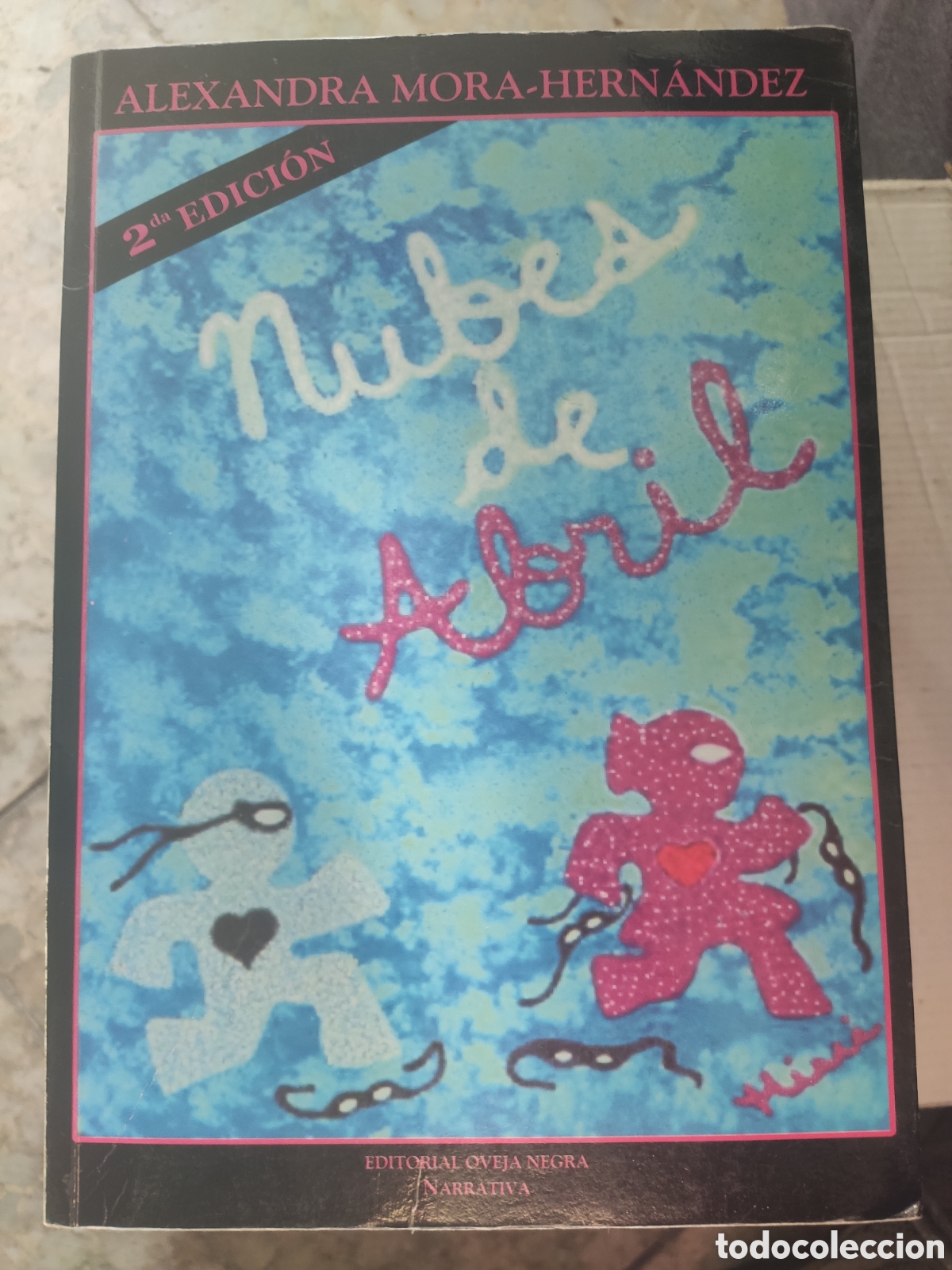 Second hand books: NUBES DE ABRIL. ALEXANDRA MORA HERNANDEZ. OVEJA NEGRA