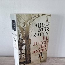 Libros de segunda mano: CARLOS RUIZ ZAFON - EL JUEGO DEL ÁNGEL - PLANETA 2009 1ª EDICIÓN EN RÚSTICA ( CON CD). Lote 401199389