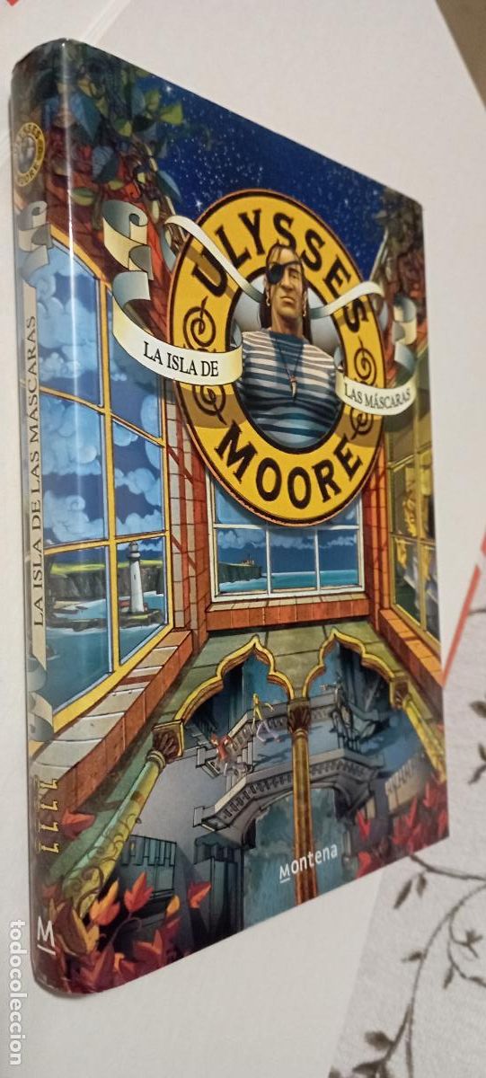 Libros de segunda mano: PLI - ULYSES MOORE - LA ISLA DE LAS M&Aacute;SCARAS - COMO NUEVO - 1&ordf; EDICI&Oacute;N 2008 - MONTENA