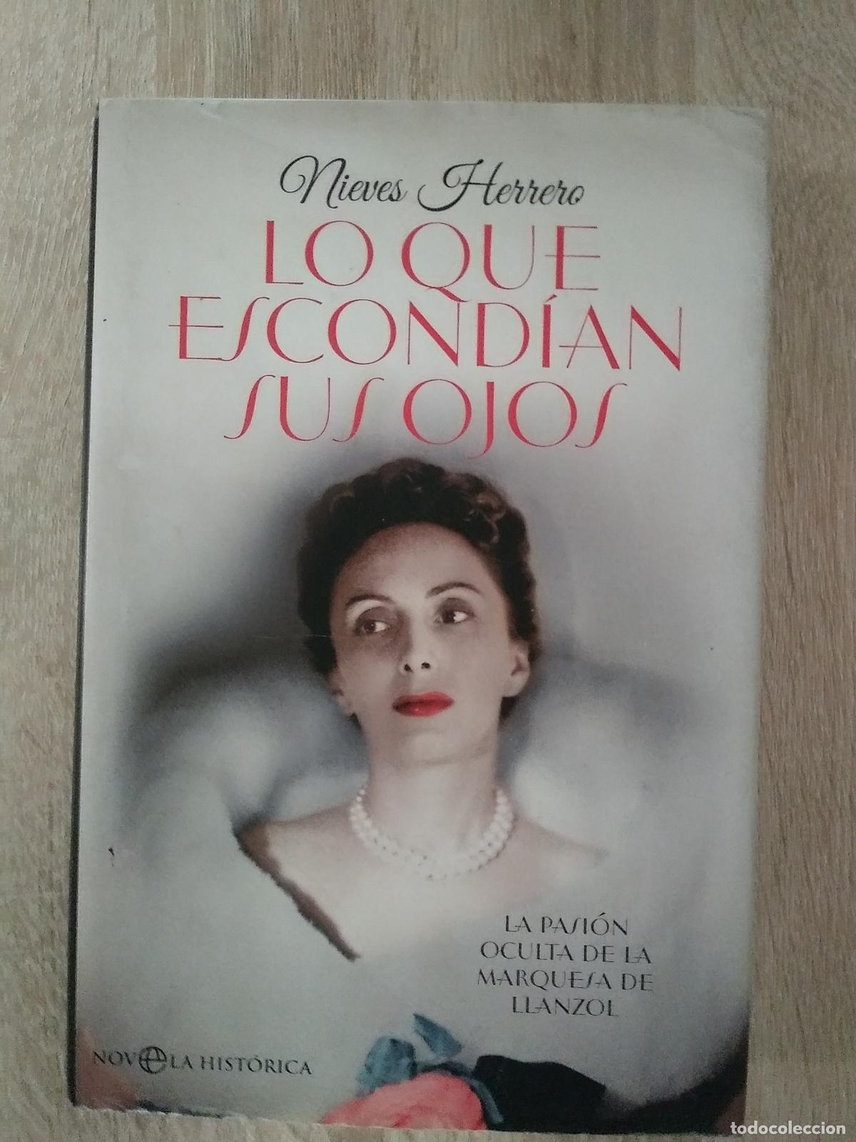 Libros de segunda mano: LO QUE ESCONDIAN SUS OJOS - NIEVES HERRERO.