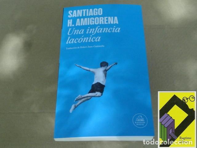 Libros de segunda mano: AMIGORENA, Santiago H.: Una infancia lac&oacute;nica (Trad:Robert Juan Cantavella)