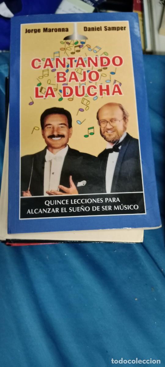 Libros de segunda mano: CANTANDO BAJO LA LLUVIA JORGE MARONNA DANIEL SAMPER LIBRO GG-UEL