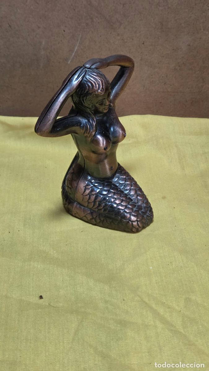 Libros de segunda mano: encendedor de figura de mujer