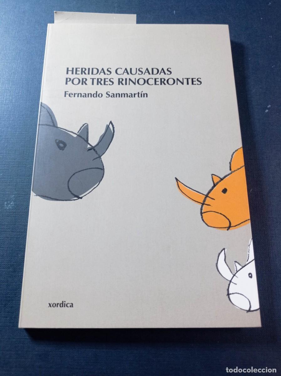 Libros de segunda mano: HERIDAS CAUSADAS POR TRES RINOCERONTES. FERNANDO SANMART&Iacute;N. XORDICA, 2008. FIRMADO POR EL AUTOR +++