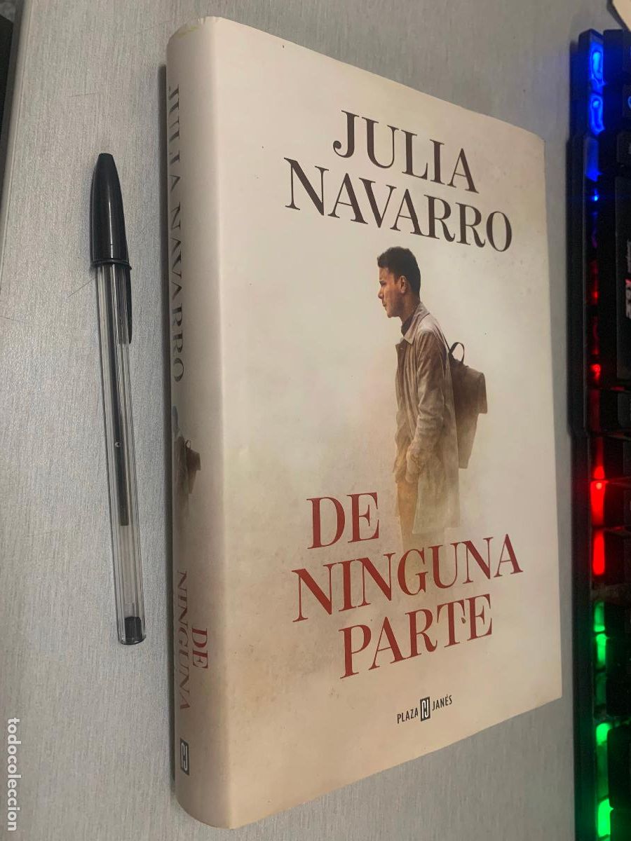 Libros de segunda mano: DE NINGUNA PARTE / JULIA NAVARRO / PLAZA & JAN&Eacute;S 1&ordf; EDICI&Oacute;N 2021