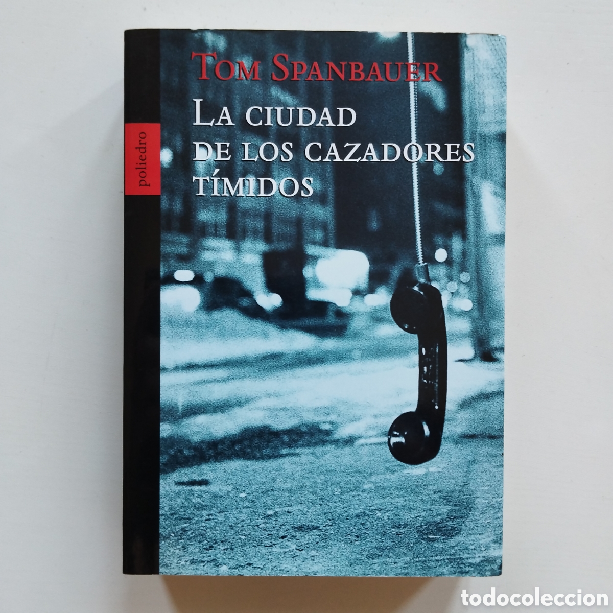 Libros de segunda mano: TOM SPANBAUER LA CIUDAD DE LOS CAZADORES T&Iacute;MIDOS POLIEDRO 2001 NUEVO