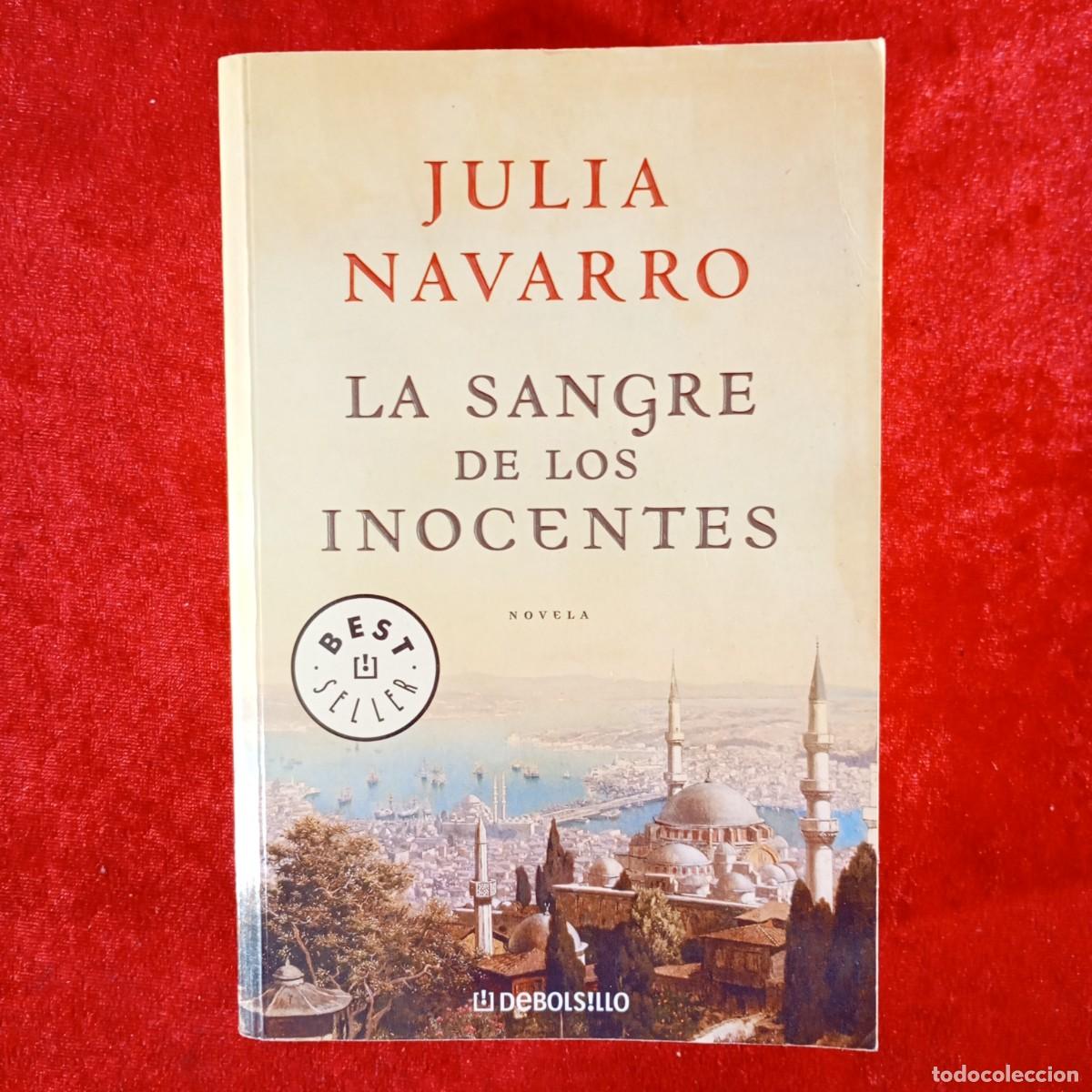 Libros de segunda mano: JULIA NAVARRO - LA SANGRE DE LOS INOCENTES - NOVELA - DEBOLSILLO / 947