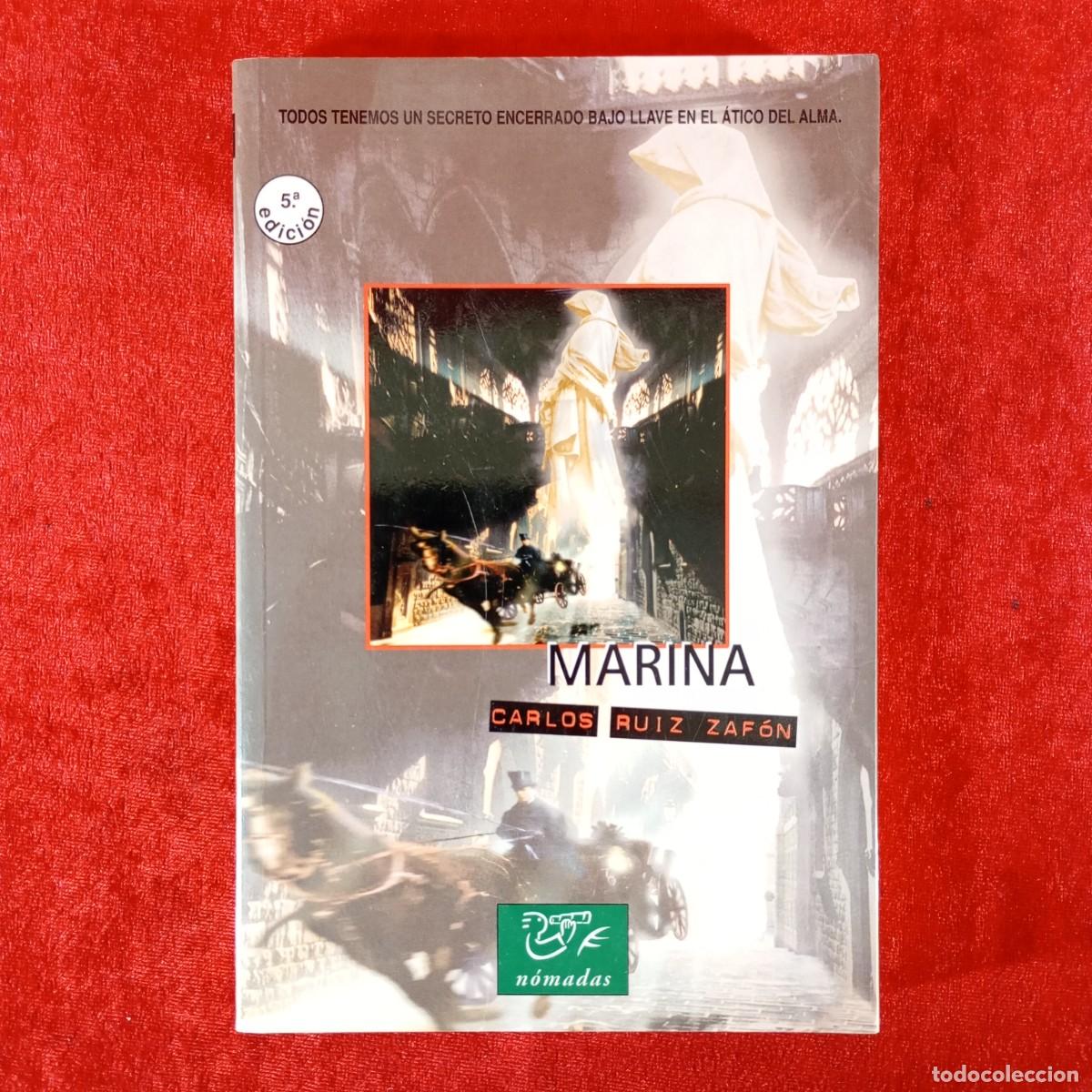 Libros de segunda mano: MARINA - CARLOS RUIZ ZAF&Oacute;N - N&Oacute;MADAS - TODOS TENEMOS UN SECRETO ENCERRADO BAJO LLAVE / 1079