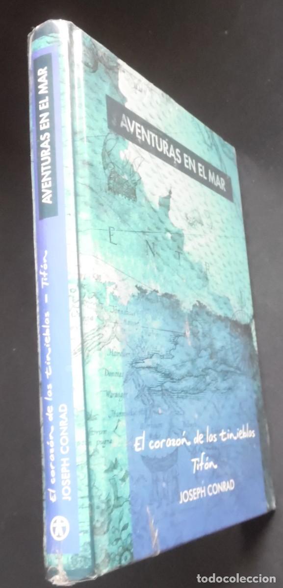 Libros de segunda mano: El coraz&oacute;n de las tinieblas y Tif&oacute;n, de Joseph Conrad. Edici&oacute;n en tapa dura. Precintado, intacto