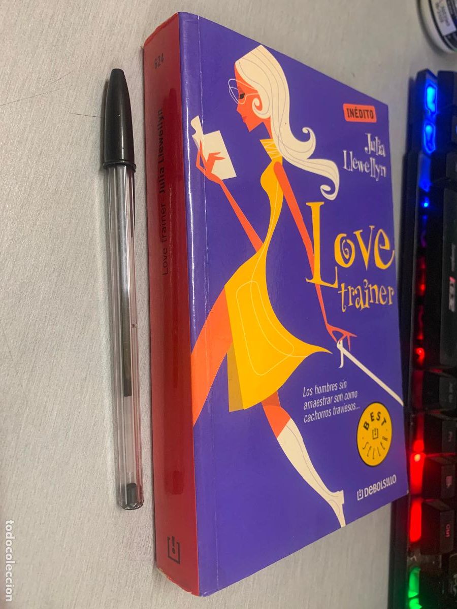 Libros de segunda mano: LOVE TRAINER / JULIA LLEWELLYN / DEBOLSILLO 2005