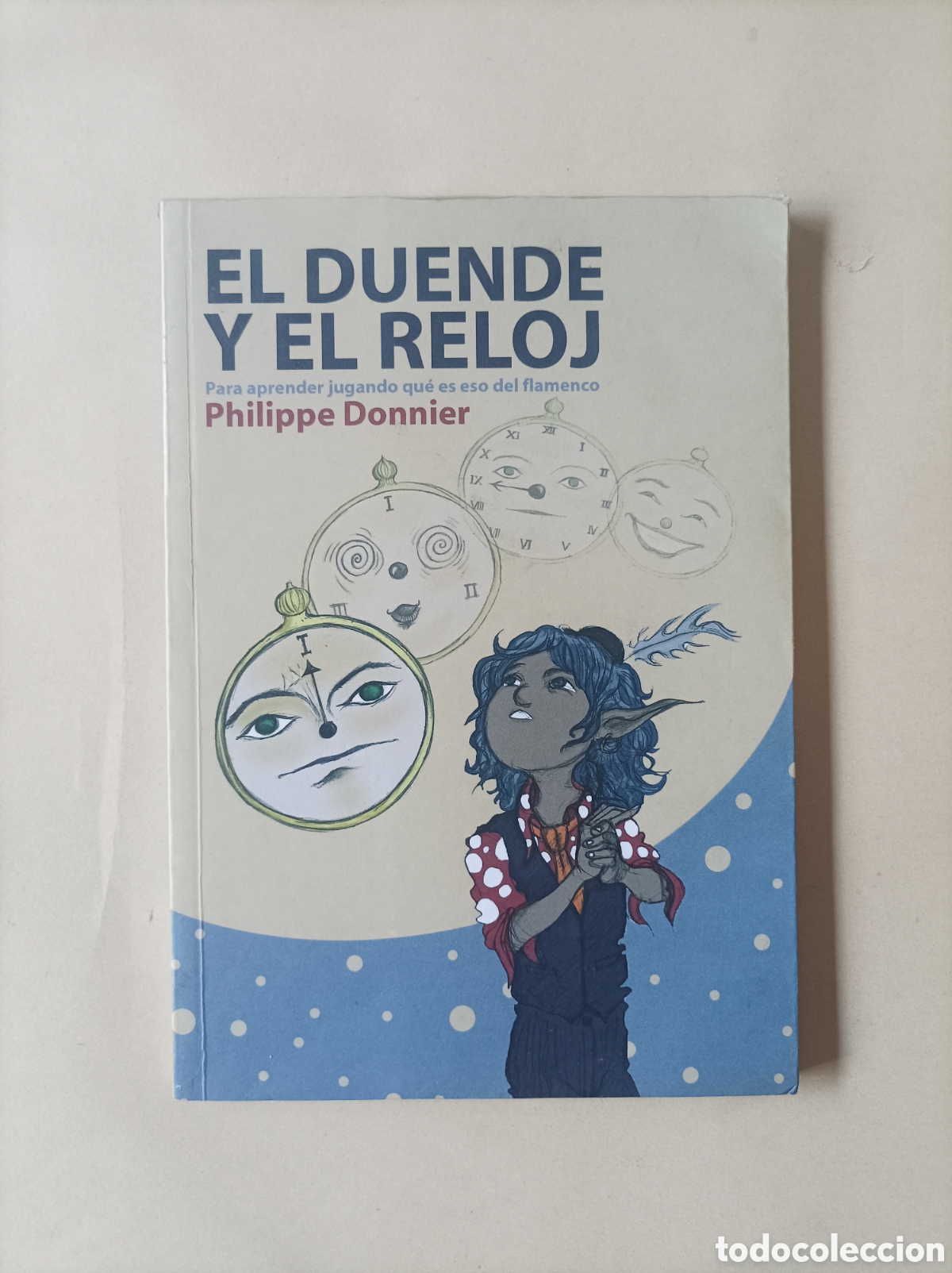 Livros em segunda m&atilde;o: El duende y el reloj, Para aprender jugando qu&eacute; es eso del flamenco / Philippe Donnier