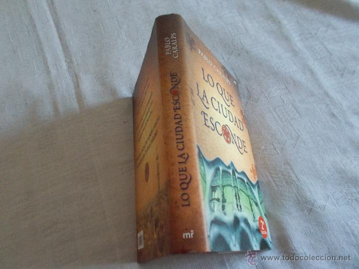 Libros de segunda mano: LO QUE LA CIUDAD ESCONDE - Foto 2