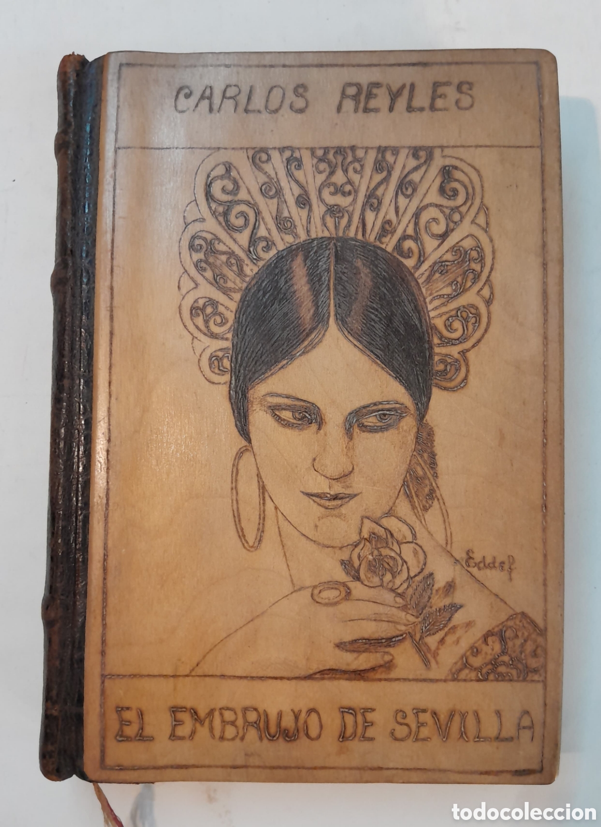 Libros de segunda mano: Carlos Reyles. El embrujo de Sevilla. Tapa pirograbada en madera y lomo de cuero con nervios. EDDEF