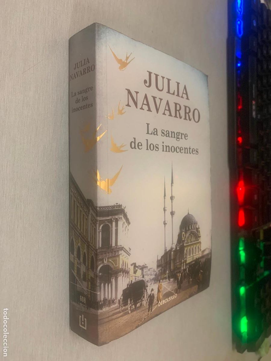 Libros de segunda mano: LA SANGRE DE LOS INOCENTES / JULIA NAVARRO / DEBOLSILLO 2016