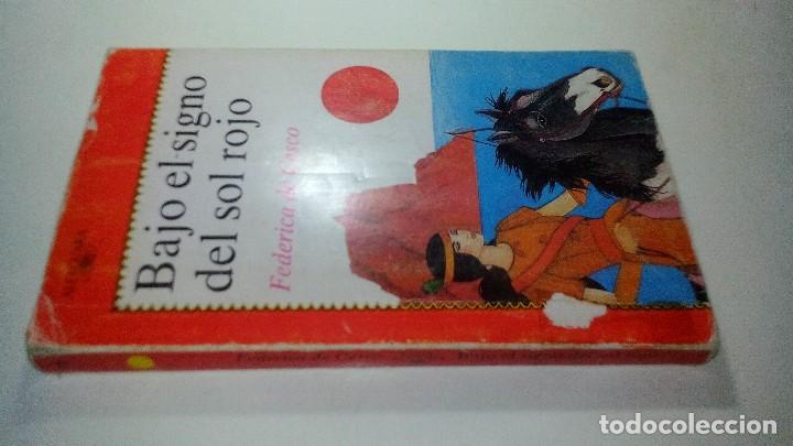 Gebrauchte B&uuml;cher: BAJO EL SIGNO DEL SOL ROJO-Federica de Cesco-ALFAGUARA 1989