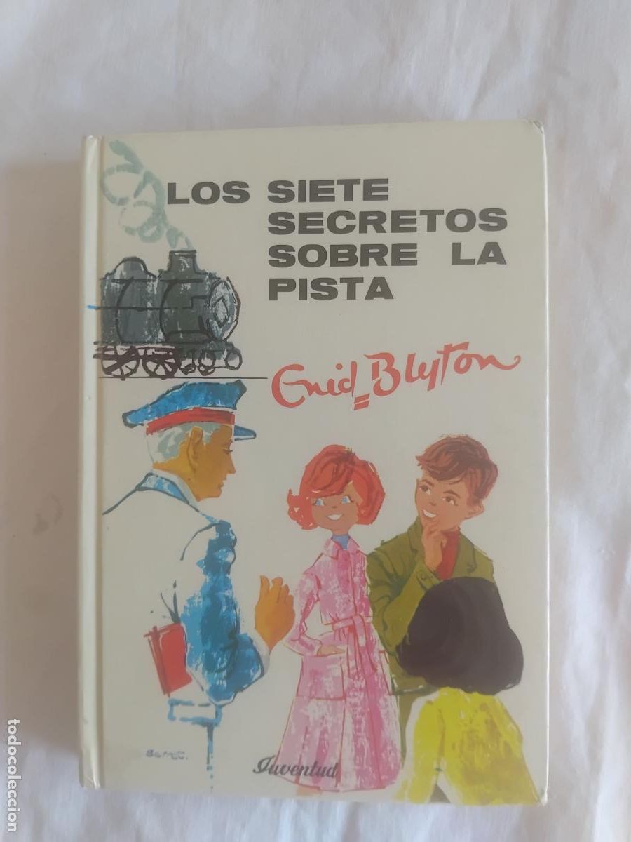 Libros de segunda mano: LOS SIETE SECRETOS SOBRE LA PISTA N&ordm; 9. ENID BLYTON. EDITORIAL JUVENTUD.