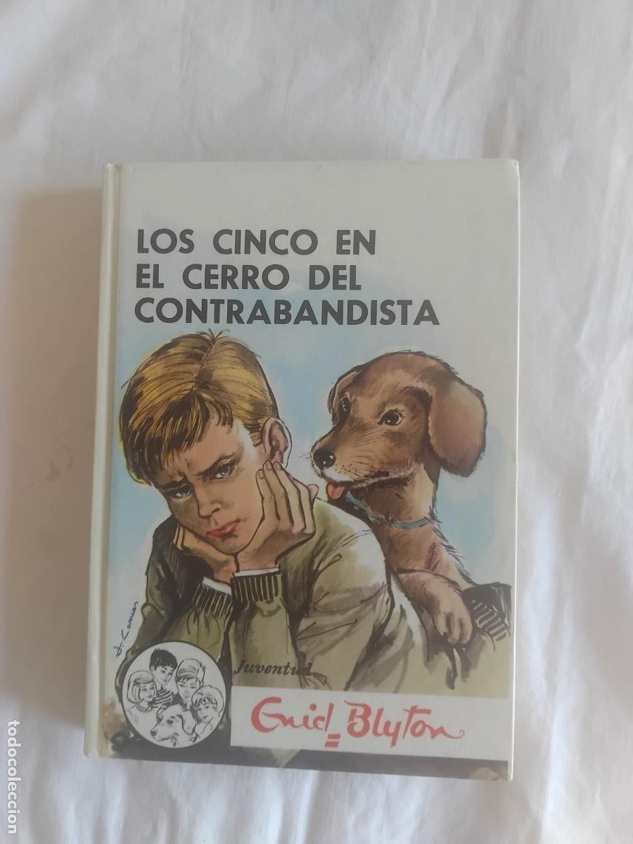 Libros de segunda mano: LOS CINCO EN EL CERRO DEL CONTRABANDISTA, N&ordm; 25 ENID BLYTON. EDITORIAL JUVENTUD.