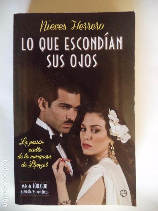 Second hand books: LO QUE ESCONDIAN SUS OJOS.NIEVES HERRERO