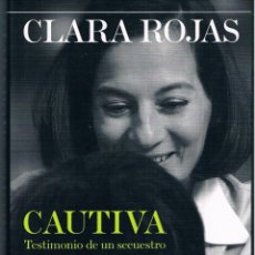 Libros de segunda mano: CAUTIVA (HISTORIA REAL) DOS FOTOGRAFÍAS ((COMO NUEVO)) TAPAS DURAS. Lote 140047454