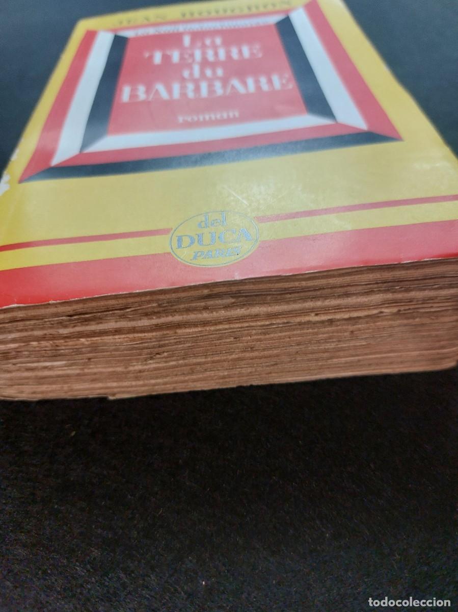 Libros de segunda mano: LA TERRE DU BARBARE A&Ntilde;O 1958 - Foto 2