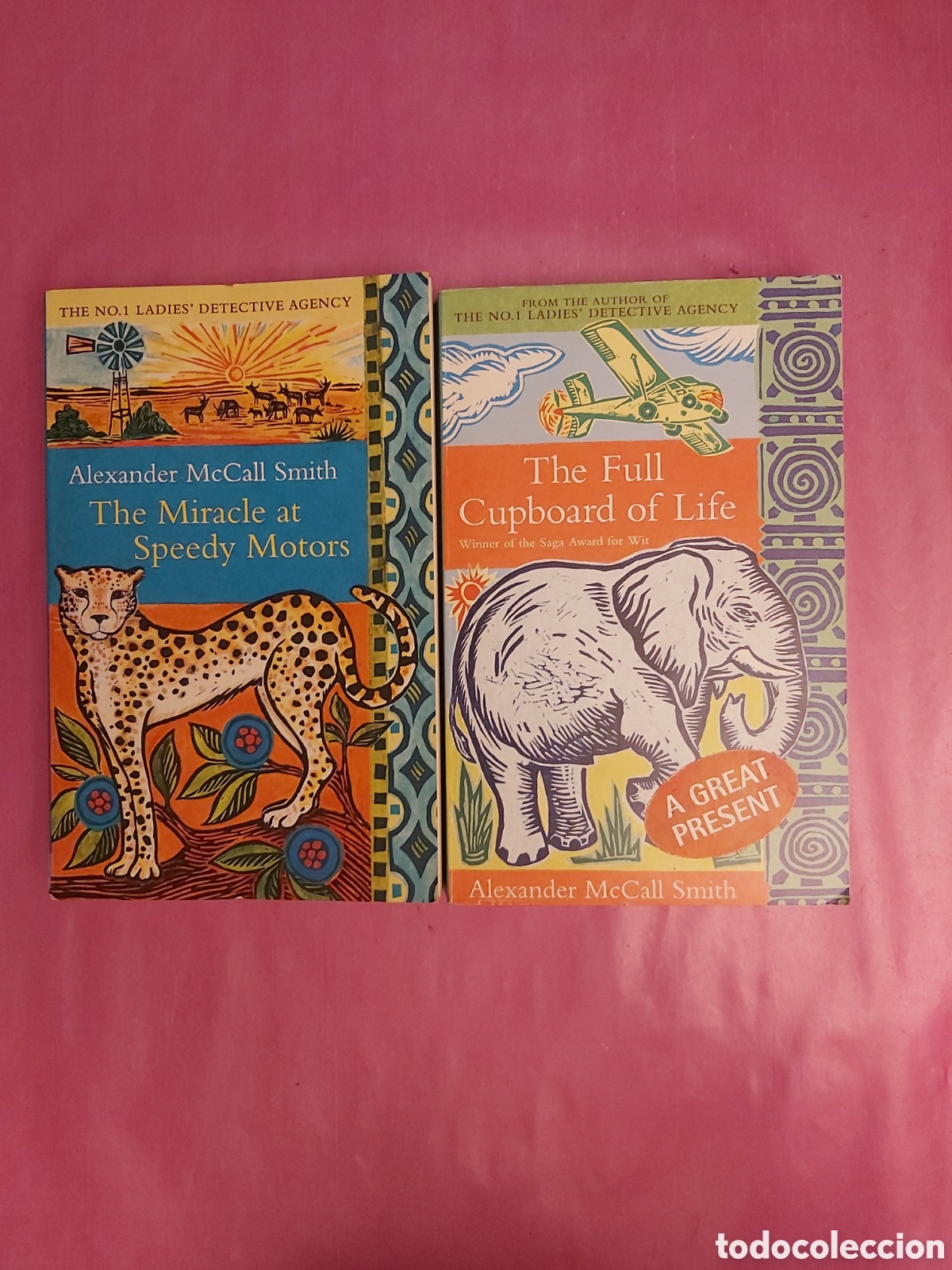 Libros de segunda mano: THE MIRACLE AT SPEEDY MOTORS / THE FULL CUPBOARD OF LIFE INGL&Eacute;S ALEXANDER McCALL SMITH ABACUS