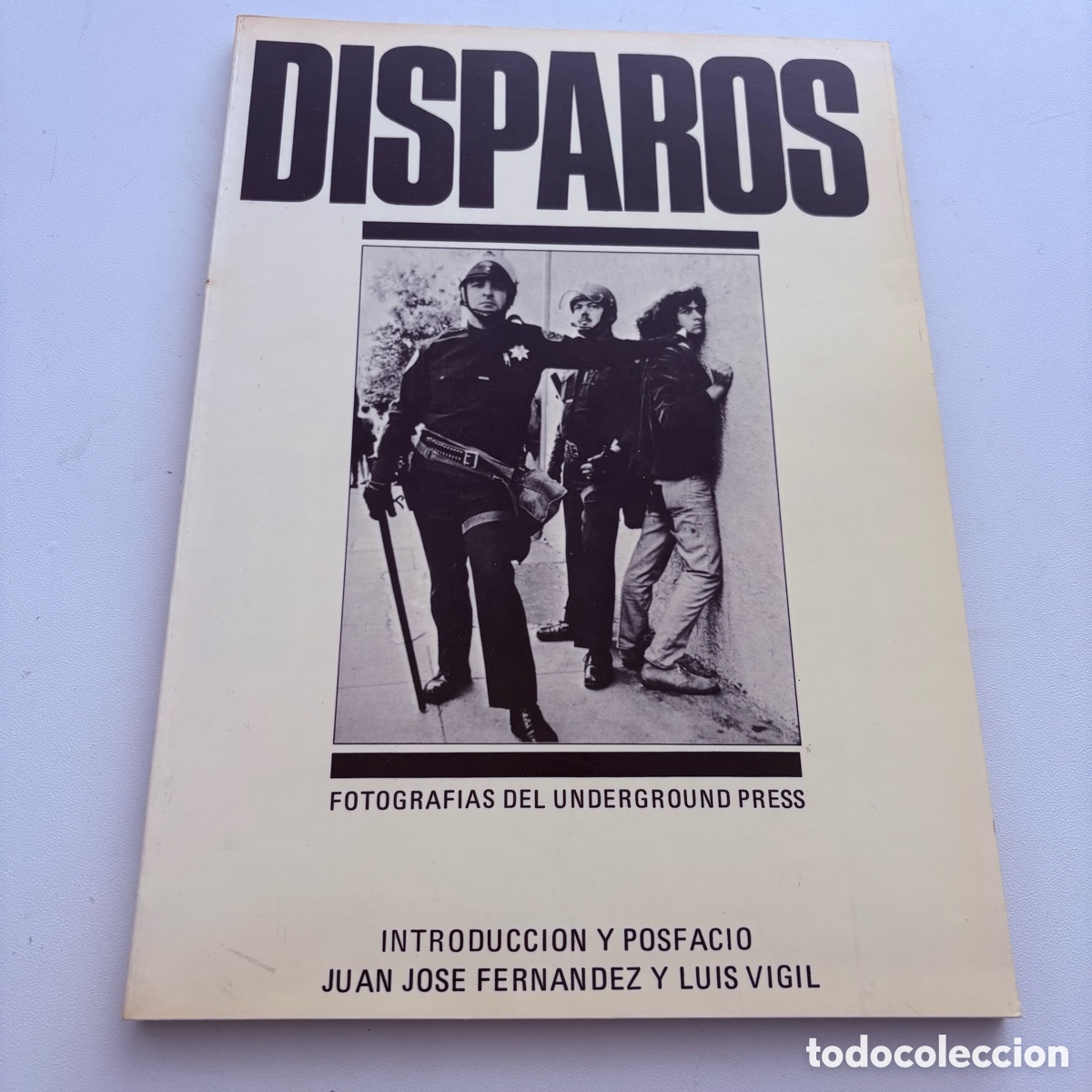 Libros de segunda mano: LIBRO DISPAROS FOTOGRAFIAS DEL UNDERGROUND PRESS 1979 nuevo sin usar