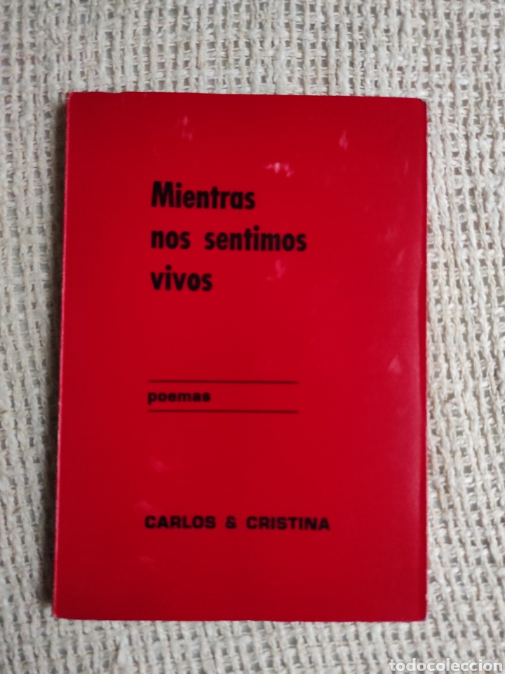 Second hand books: Mientras nos sentimos vivos, poemas / CARLOS & CRISTINA