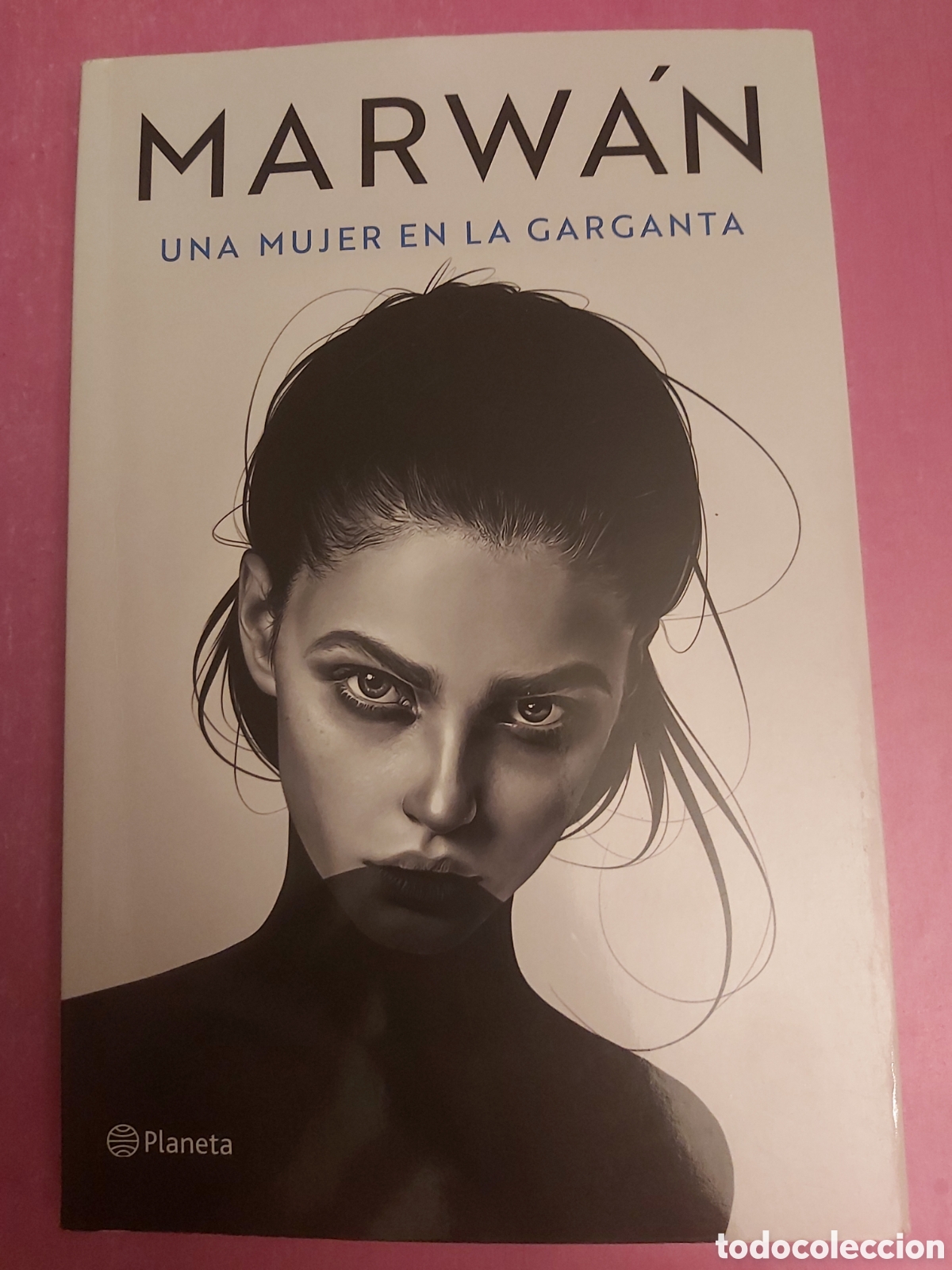 Libros de segunda mano: UNA MUJER EN LA GARGANTA MARWAN PLANETA PRIMERA EDICI&Oacute;N 2021