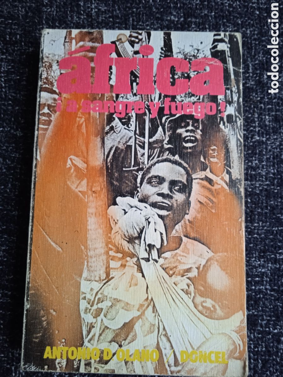 Libros de segunda mano: AFRICA A SANGRE Y FUEGO / AUTOR: ANTONIO D. OLANO -edita : DONCEL 1975