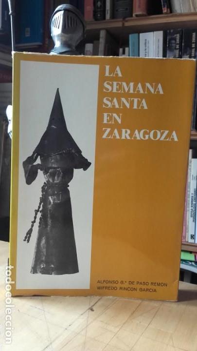 Libros de segunda mano: GARCIA DE PASO / RINCON: LA SEMANA SANTA EN ZARAGOZA, (UNALI, 1981). DEDICADO.