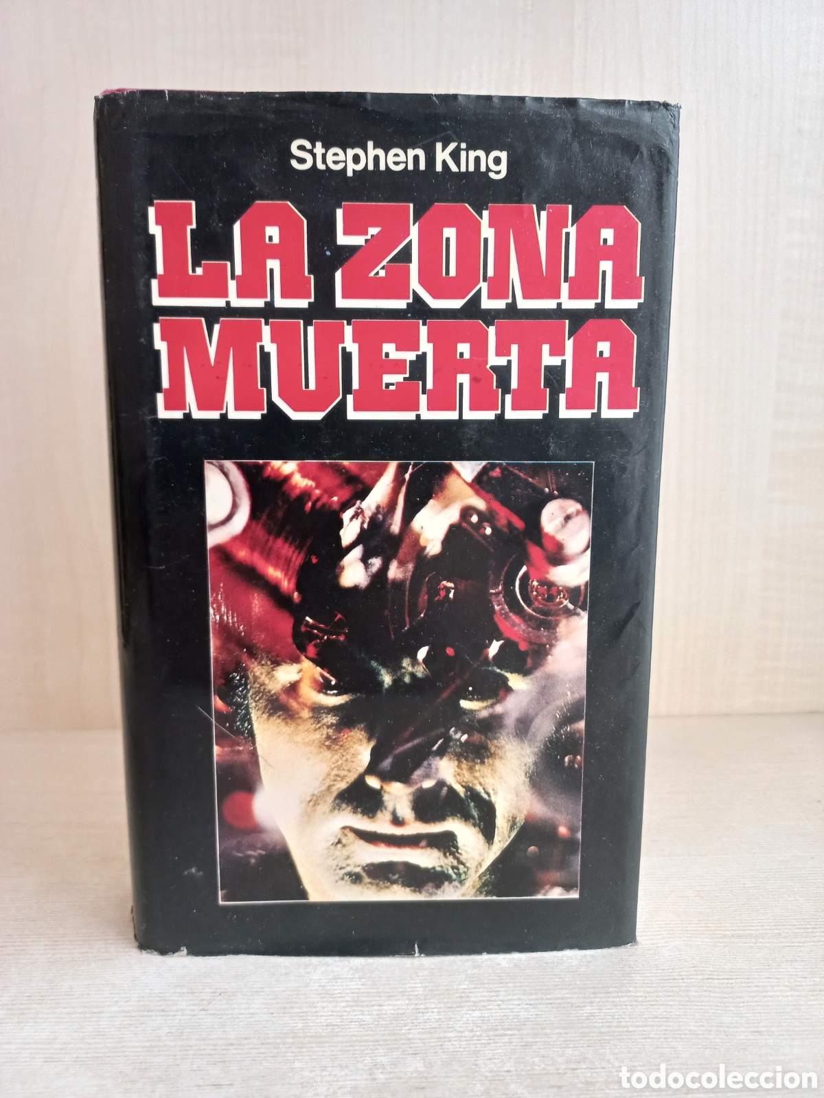 Gebrauchte B&uuml;cher: La zona muerta. Stephen King. Mundo Actual de Ediciones, 1981. Terror.