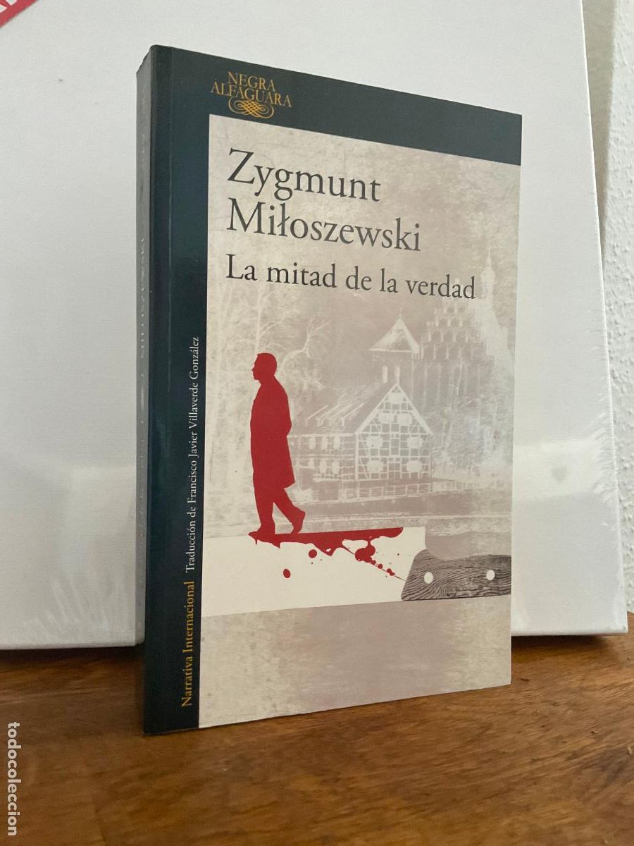 Libros de segunda mano: LA MITAD DE LA VERDAD - ZYGMUNT MILOSZEWSKI - ALFAGUARA / FORMATO GRANDE - MUY BUEN ESTADO