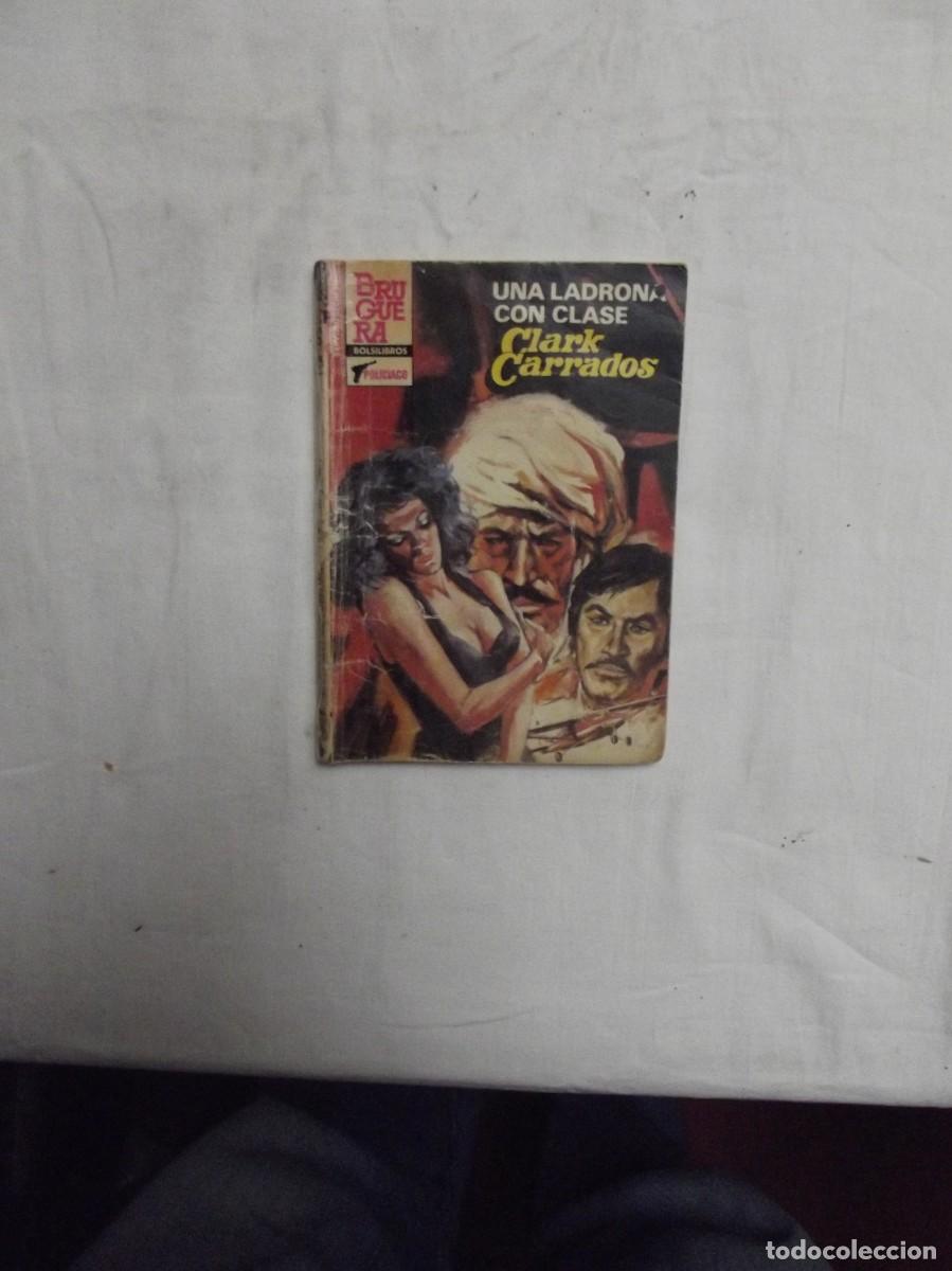 Second hand books: NOVELA POLICIACA - UNA LADRONA CON CLASE POR CLARK CARRADOS ( MUY USADA )