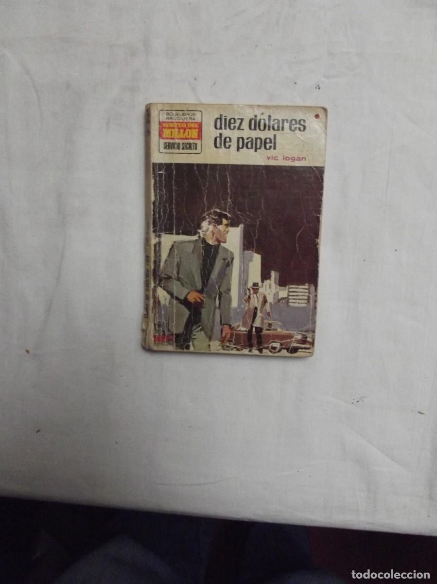 Libros de segunda mano: NOVELA POLICIACA - DIEZ DOLARES DE PAPEL POR VIC LOGAN ( MUY USADA )