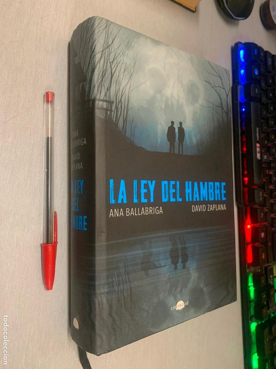 Libros de segunda mano: LA LEY DEL HAMBRE / ANA BALLABRIGA, DAVID ZAPLANA / CONTRALUZ 2023