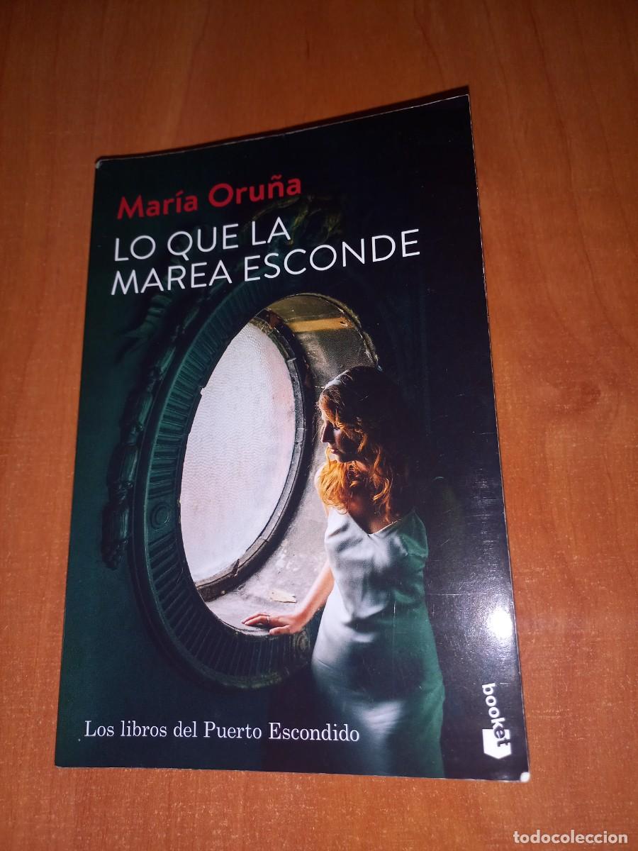 Libros de segunda mano: LO QUE LA MAREA ESCONDE - MARIA ORU&Ntilde;A