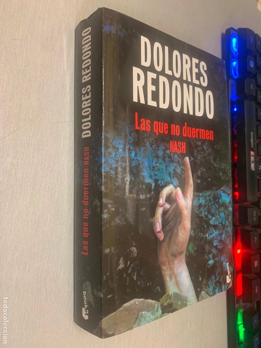 Libros de segunda mano: LAS QUE NO DUERMEN NASH / DOLORES REDONDO / DESTINO BOOKET 2026
