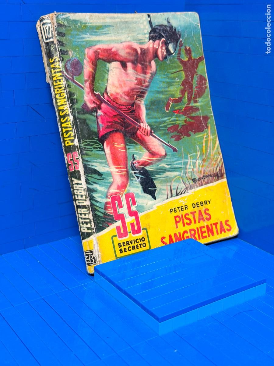 Libros de segunda mano: PISTAS SANGRIENTAS DE LA SERIE SERVICIO SECRETO - PETER DEBRIE