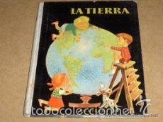 Libros de segunda mano: LA TIERRA. EDITORIAL AGUILAR - Foto 1