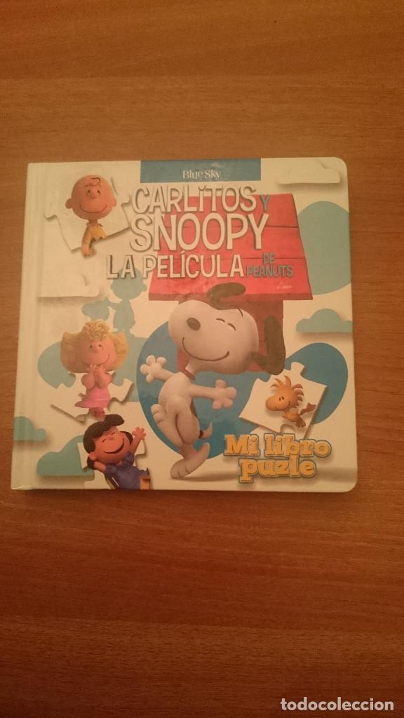 Libros de segunda mano: CARLITOS SNOOPY LA PELICULA DE PEANUTS , MI LIBRO PUZLE - Foto 1