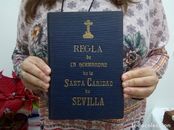 Libros de segunda mano: 1919 SEMANA SANTA REGLA DE LA HERMANDAD DE LA SANTA CARIDAD DE SEVILLA 23 CM 490 GRS G6